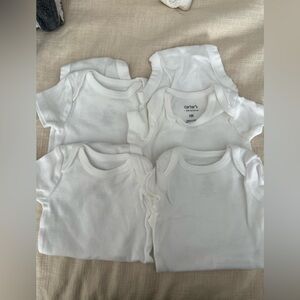 Carter’s 4-Pack White Onesies